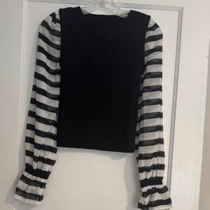 Maeve by Anthropologie black sweater with sheer white and black stripes sleeves